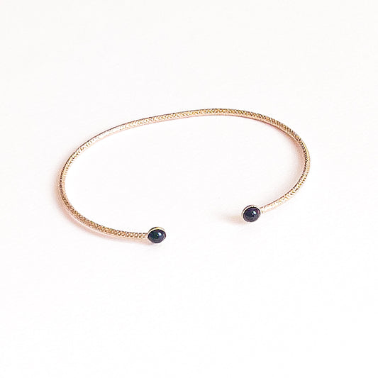 Jonc Ariane cabochon en agate noire (4mm) doré